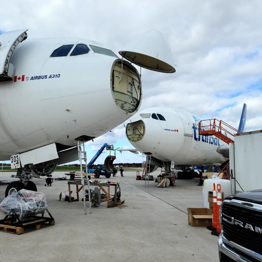 Multiple aircraft being tore down